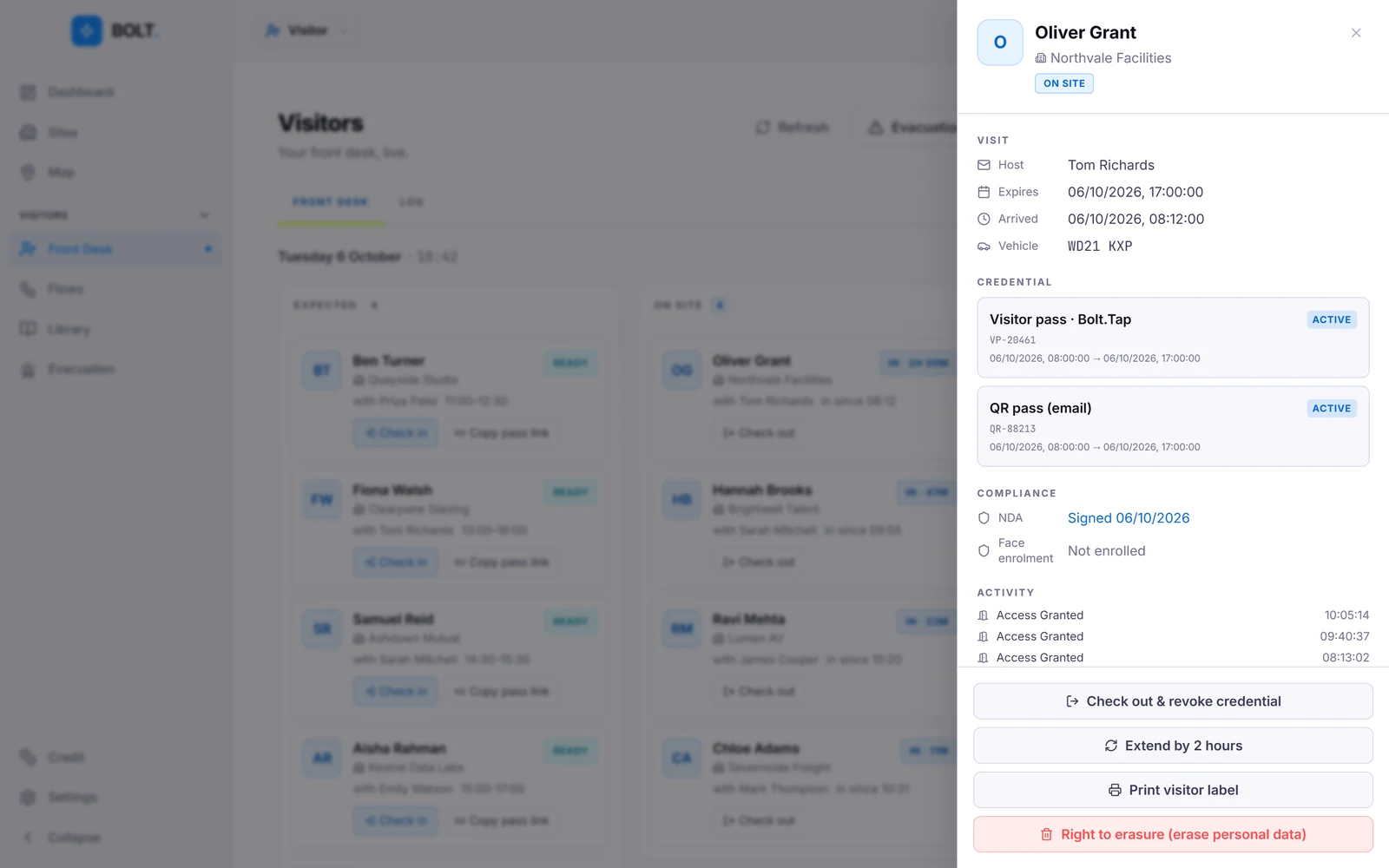 Visit detail: host, times, vehicle, the visitor’s passes, NDA signed, activity, and Check out and revoke credential.